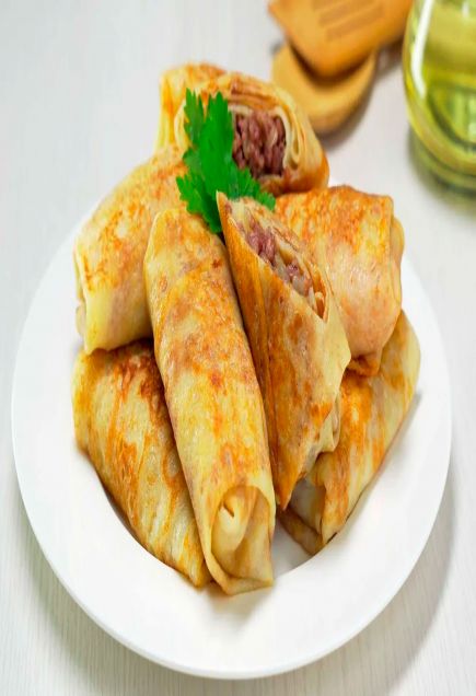 нежные тонкие блинчики с ароматной мясной начинкой